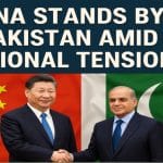 "President Xi Jinping and Prime Minister Shehbaz Sharif shaking hands in front of Chinese and Pakistani flags, highlighting strong diplomatic ties amid regional tensions."